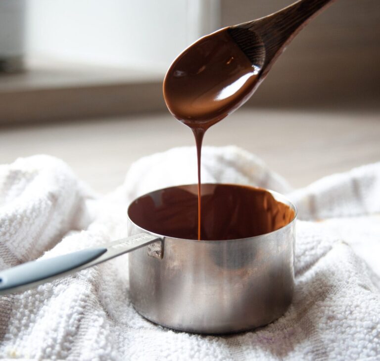 Melted and tempered chocolate on a spoon